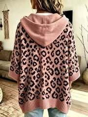 Back view of pink leopard print oversized hooded knit sweater with solid pink hood
