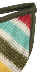 Close detail view of striped knit fabric and army green strap stitching