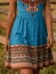 Close view of blue tribal print dress skirt with patterned border hem
