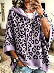 Lavender leopard print oversized hooded knit sweater with black spots, front view