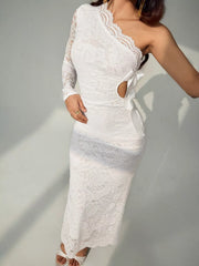 Three quarter front view of a white lace one shoulder midi dress with waist cutout