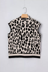 Flat lay front view of the black and cream leopard print high neck sweater on a hanger.
