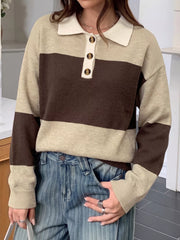 Front view of beige and brown polo sweater with long sleeves and ribbed cuffs.
