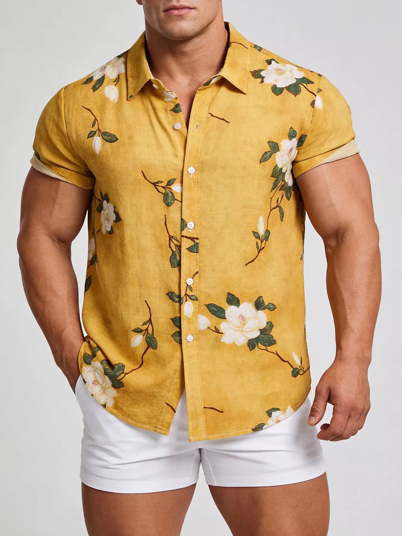 Men's floral-print short-sleeve shirt with buttons, pockets and seam detailing.