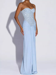 Blue strapless sequin corset maxi dress on model, full length front view in studio