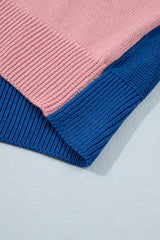 Close up of the pink ribbed hem beside the blue ribbed sweater hem