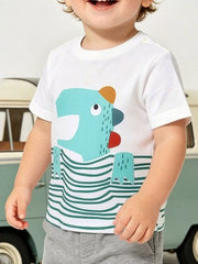 On-model front view of white children's short sleeve t-shirt with turquoise cartoon dinosaur and green stripes