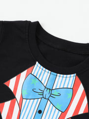 Close-up of the neckline and blue star bow tie detail on the children's black t-shirt