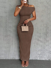 Front mirror view of a camel asymmetrical one shoulder ribbed bodycon maxi dress
