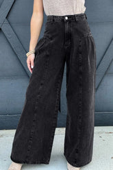 Women's black high-rise wide-leg jeans with pockets in a non-stretch cotton blend.
