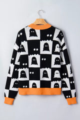 Flat back view on a hanger of a black and white ghost checkerboard sweater