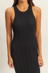 Black sleeveless ribbed knit bodycon dress bodice close up showing round neck and ribbing