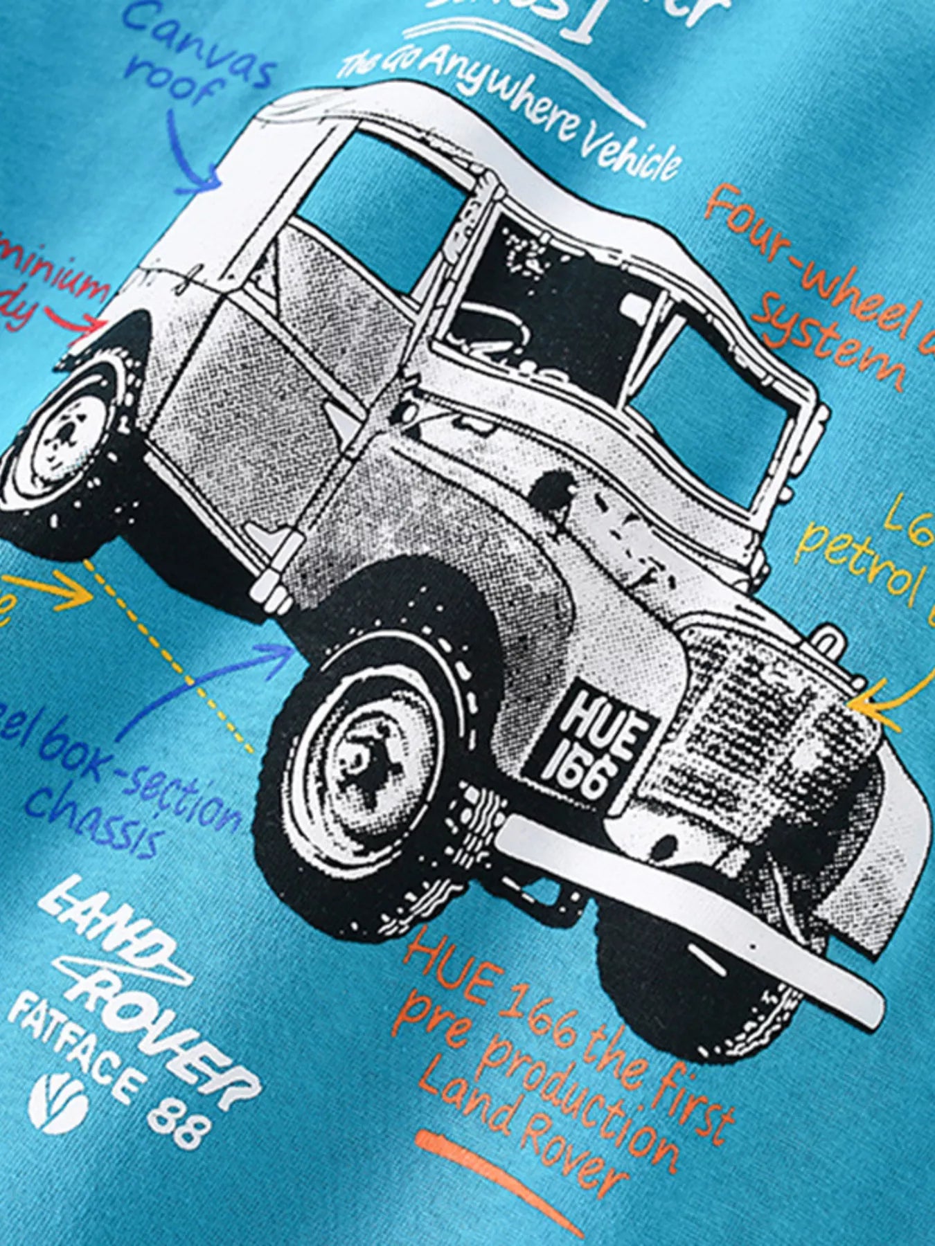 Angled close-up of vintage off-road vehicle graphic printed on cerulean children's t-shirt
