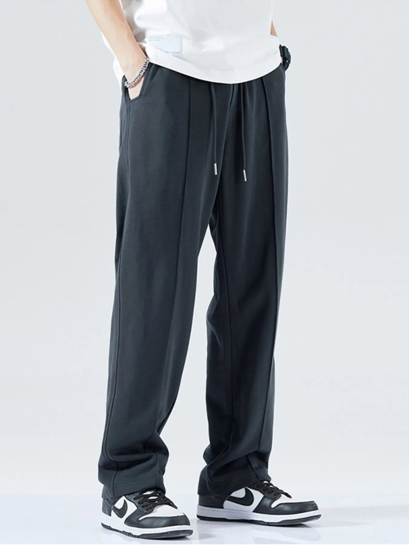 Men's wide-leg sweatpants with a drawstring waist and pockets in the Deep Sea Gray color.