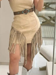 Close view of the waist, belt and fringe hem of a khaki bodycon mini dress