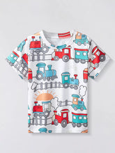 White children's short sleeve T-shirt covered in a colourful red and blue train print, shown flat.