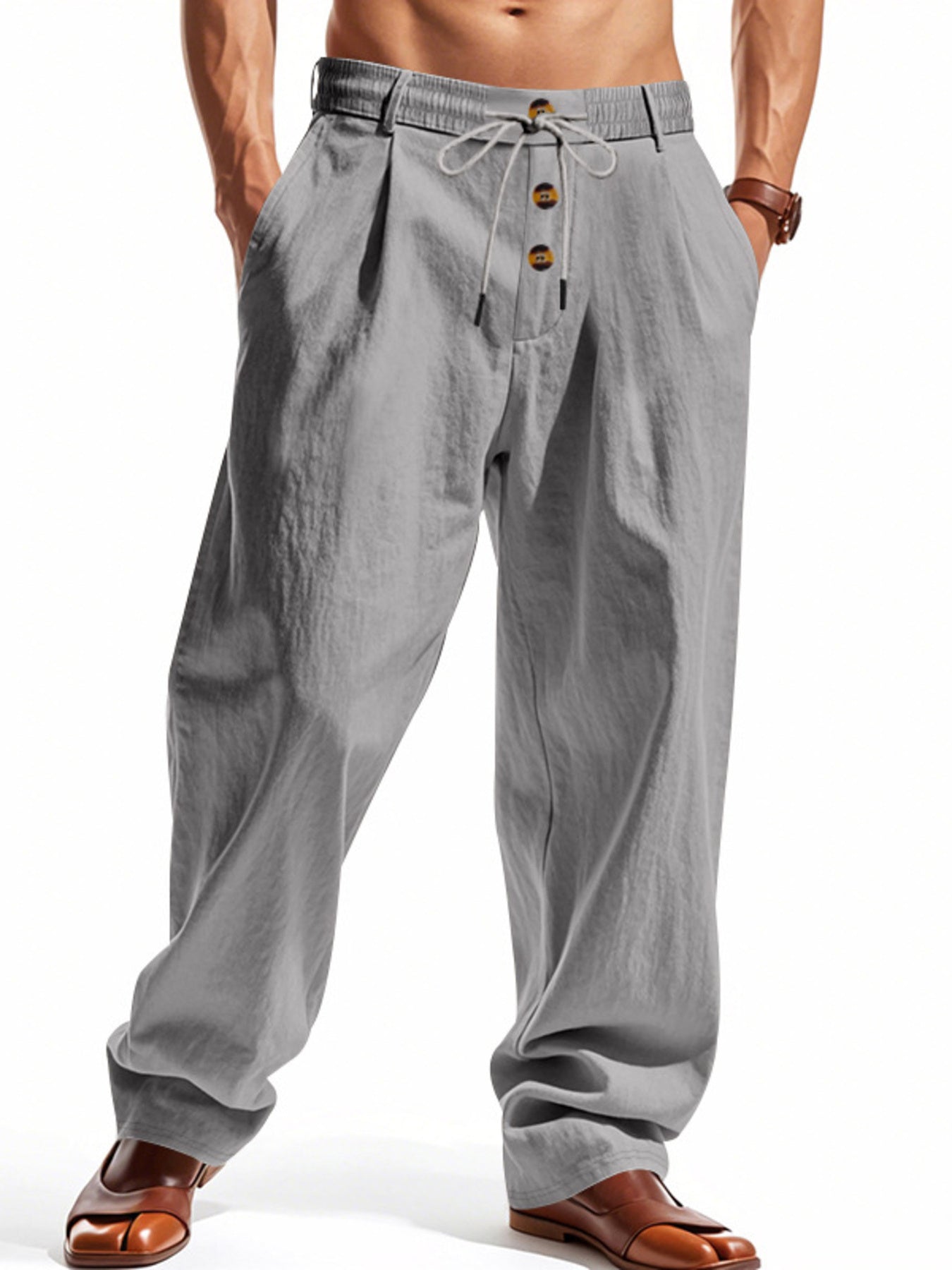 Men's grey loose-fit pants with a drawstring waist and pockets.