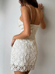 White floral lace bodycon mini dress, back and side view against wall
