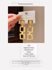 Contemporary Gold Tone Drop Earrings with Interlocking Geometric Links