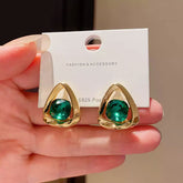 Contemporary Gold Tone Teardrop Stud Earrings with Faceted Emerald Green Cubic Zirconia