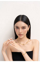 Gold Chunky Curb Chain Bracelet with Black Heart Detail