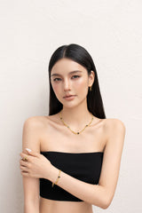 Gold Chunky Curb Chain Bracelet with Black Heart Detail