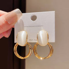 Gold Tone Drop Earrings with Iridescent White Stone on Double Hoops