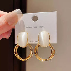 Gold Tone Drop Earrings with Iridescent White Stone on Double Hoops