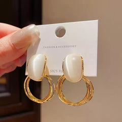 Gold Tone Drop Earrings with Iridescent White Stone on Double Hoops
