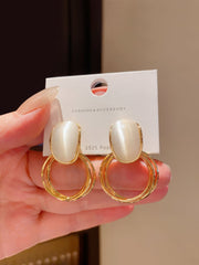 Gold Tone Drop Earrings with Iridescent White Stone on Double Hoops