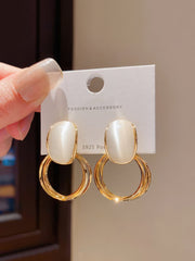 Gold Tone Drop Earrings with Iridescent White Stone on Double Hoops