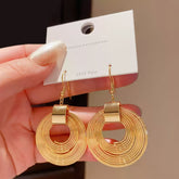 Gold Tone Drop Earrings with Layered Clear Acrylic Circles