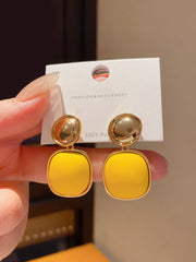 Gold Tone Drop Earrings with Round Top