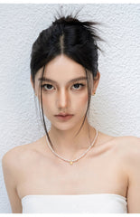 Minimalist Pearl Necklace with Gold Heart Charm