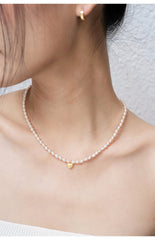 Minimalist Pearl Necklace with Gold Heart Charm