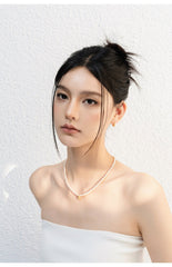 Minimalist Pearl Necklace with Gold Heart Charm