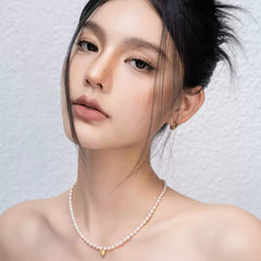 Minimalist Pearl Necklace with Gold Heart Charm