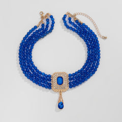 Multi-Layer Red Bead Choker with Rhinestone Pendant