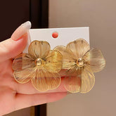 Oversized Gold Tone Flower Earrings with Delicate Filigree Wire Design