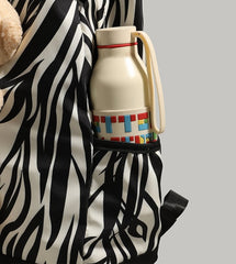Patterned Animal Print Schoolbag with Cute Plush Bear Accent