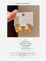 Refined Gold Tone Abstract Swirl Stud Earrings with Creamy White Faux Pearl