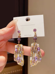 Refined Gold Tone Drop Earrings with Purple and Champagne Crystals