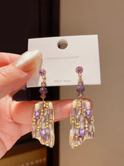 Refined Gold Tone Drop Earrings with Purple and Champagne Crystals