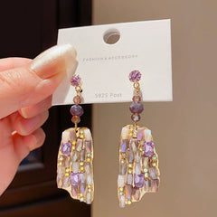 Refined Gold Tone Drop Earrings with Purple and Champagne Crystals