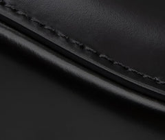 Small Black Top Handle Bag with Unique Gold Tone Hand Sculpture