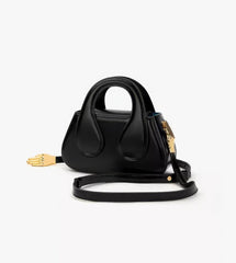 Small Black Top Handle Bag with Unique Gold Tone Hand Sculpture