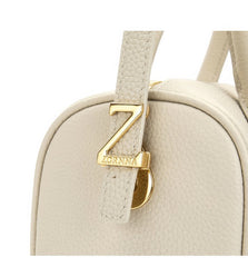 Small Off-White Top Handle Bag with Unique Gold Tone Hand Sculptures
