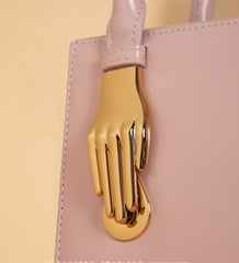 Small Pale Pink Tote Bag with Unique Gold Tone Hand Sculptures