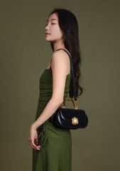 Sophia Black Leather Top Handle Bag with Unique Clock Face Clasp