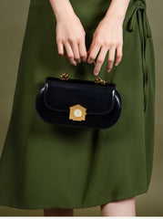 Sophia Black Leather Top Handle Bag with Unique Clock Face Clasp